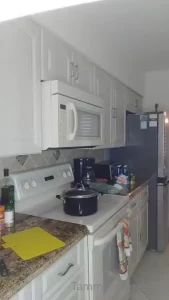 Cooking yellow rice and chicken