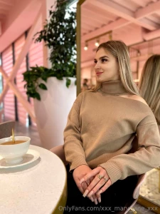 Sitting in a coffee shop i am enveloped in elegance with interest