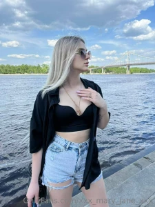 In the background of the dnipro river the sunset paints the sky in