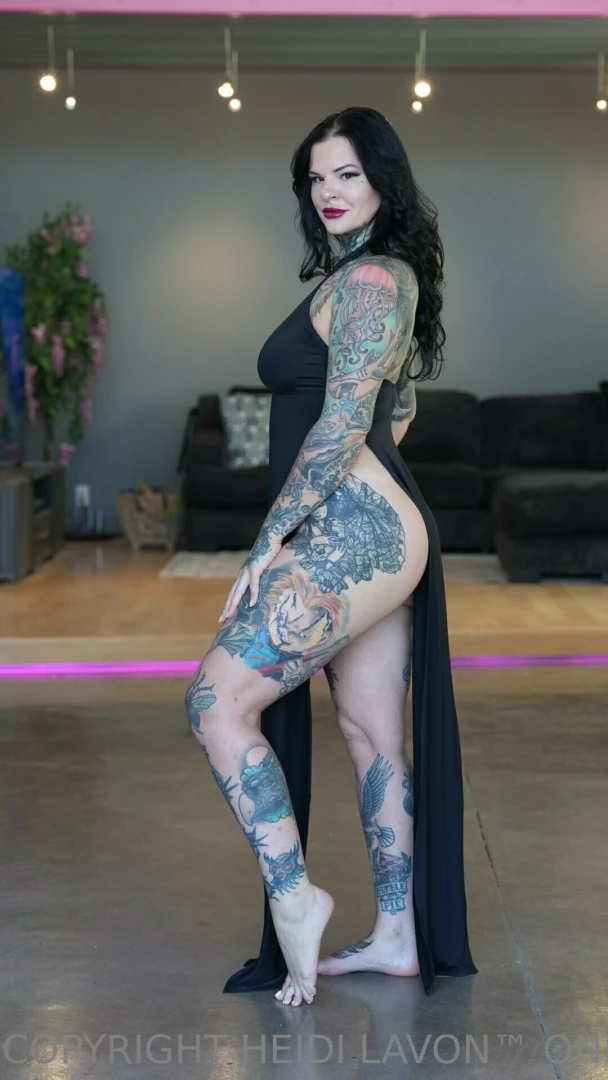 Posing in this black dress and taking sexy and naughty pictures in it 