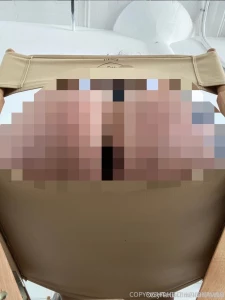 Closeup ass views sitting on a studio chair you can see the outside of