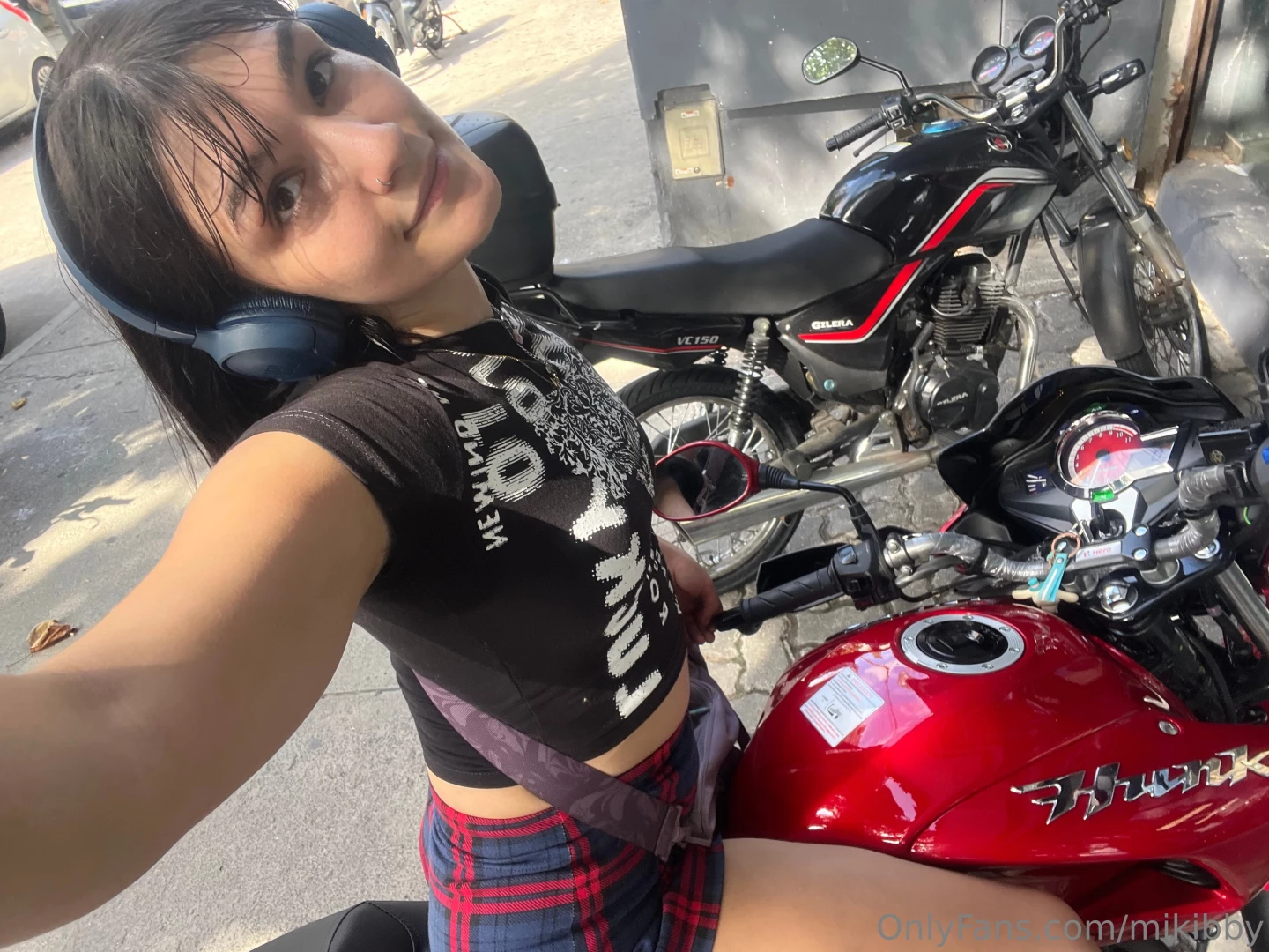 With my bike uwu 