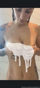 Spraying my sweet milk all over the shower glass and rubbing my tits