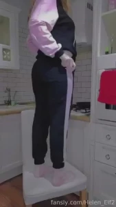Trying to reach the top shelf sport sporty sportsuit teen cute 18