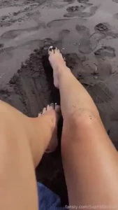 Feet in the sand the beach