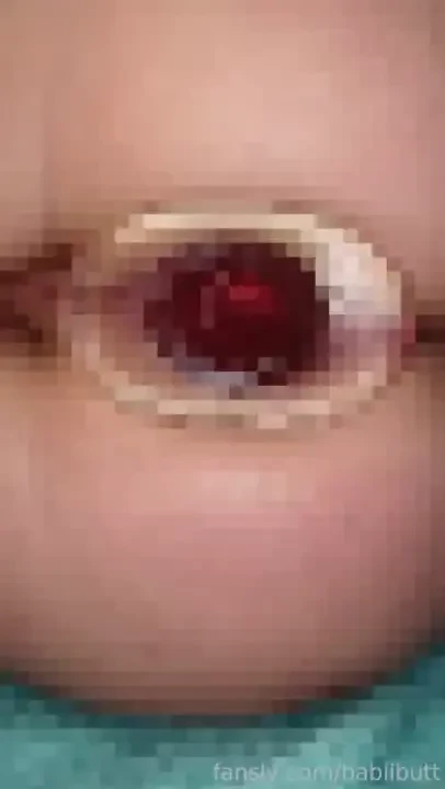 Would you like to see if your cock would fit through my tunnel plug 