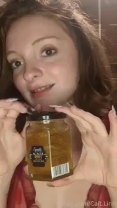 Trying honey with the comb it was yummy and so sweet redhead redhair