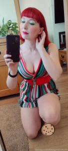 Wooo more hot red head jumpsuit babe lovely legs and boob cleavage in