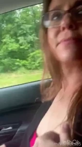 Nothing makes a road trip pass by like having your lactating tits out