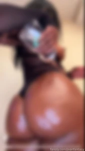 Can you tell who my favourite artist is oiled up fun in a fishnet