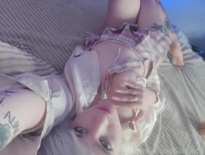 I m lying on the bed caressing myself a little