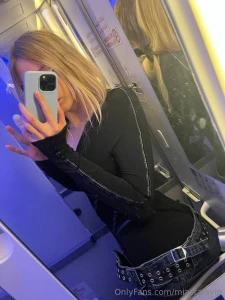 How about a photo of bare breasts on an airplane