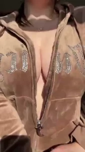 Unzipping my jacket showing a sexy surprise underneath and playing