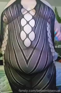 Watch me struggle to get these fishnets over my massive empty belly --