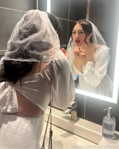 It s my bachelorette party weekend touching up my makeup in a bar