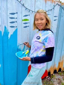 Painting the fence on a surprisingly chilly day in florida