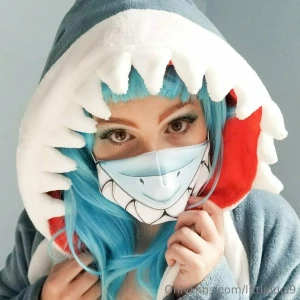 Shark in the water triangle coming up eat all the bikini ladies munch