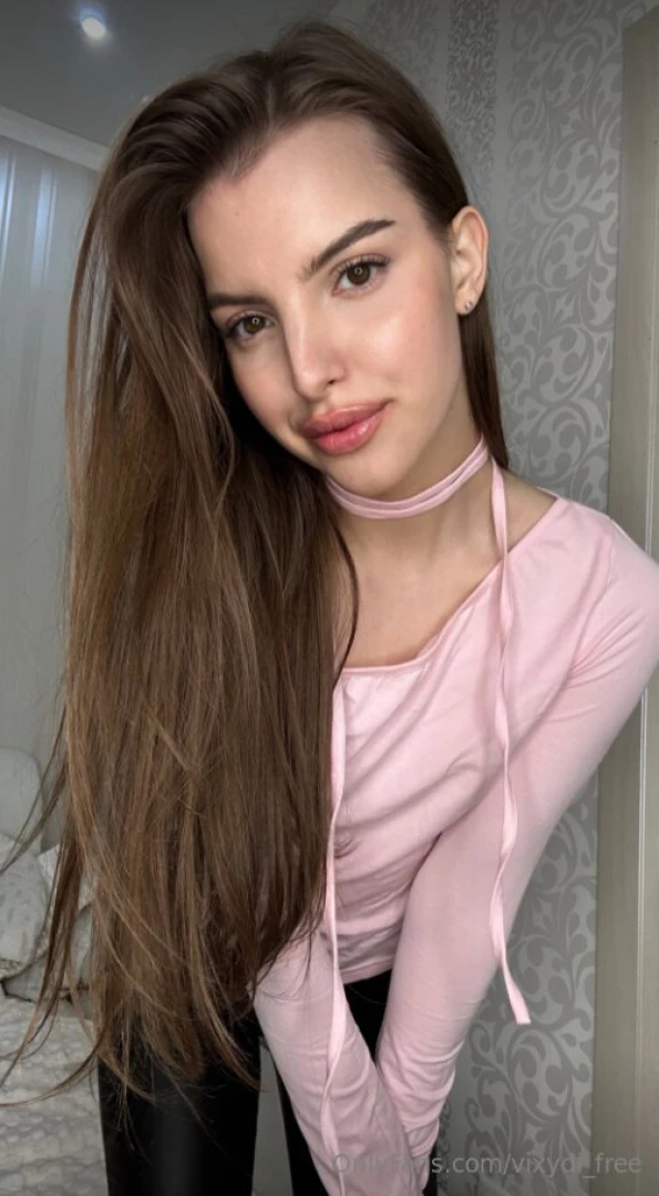 Wrapped in the soft embrace of my blush pink sweater adorned with 