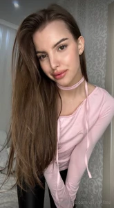 Wrapped in the soft embrace of my blush pink sweater adorned with