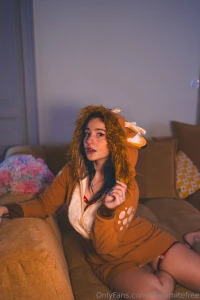Lady in the street beast in the sheets