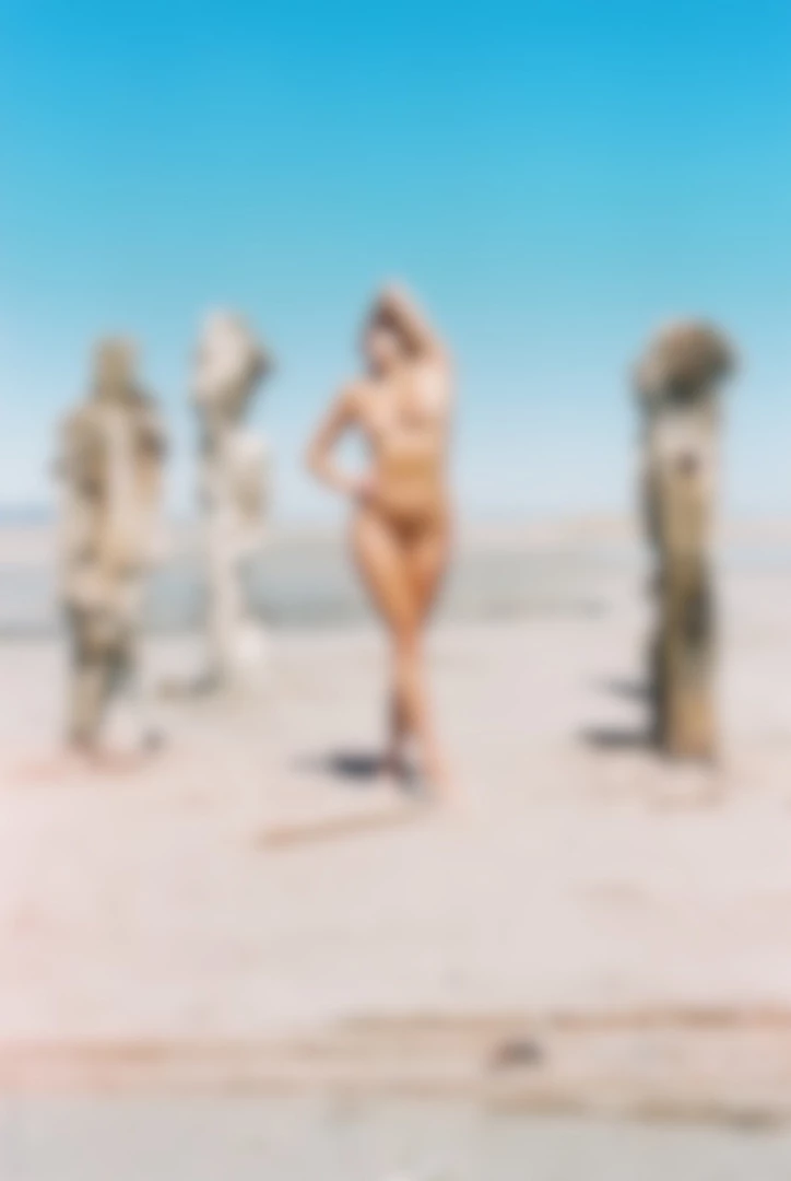Seven fine art nude photos taken at the burned-down boardwalk near the 