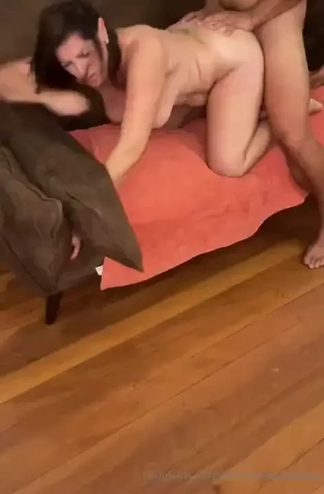 The sofa was softer than the desk but his cock was just as hard 