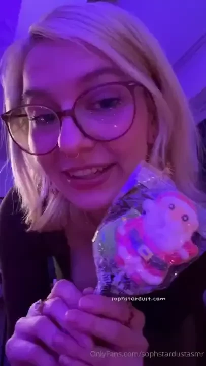 Little asmr soft spoken clip eating a christmas marshmallow lolli 