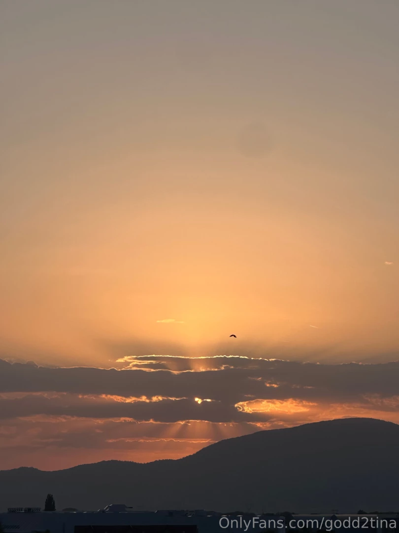 Watching the sunset from my new apartment s balcony and feeling 