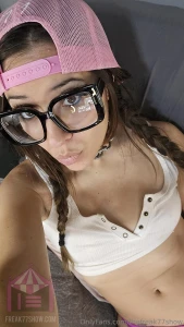 Backwards hat brown eyes white tank freak77show