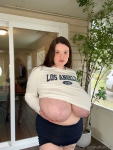 Just your friendly neighbor that likes to play with her titties on the