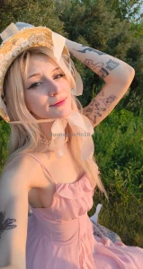 Wearing this soft pink dress in the middle of nature feels like a