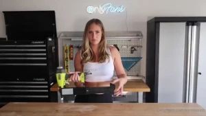 Nail guns have little slide out trays that hold the nails in place