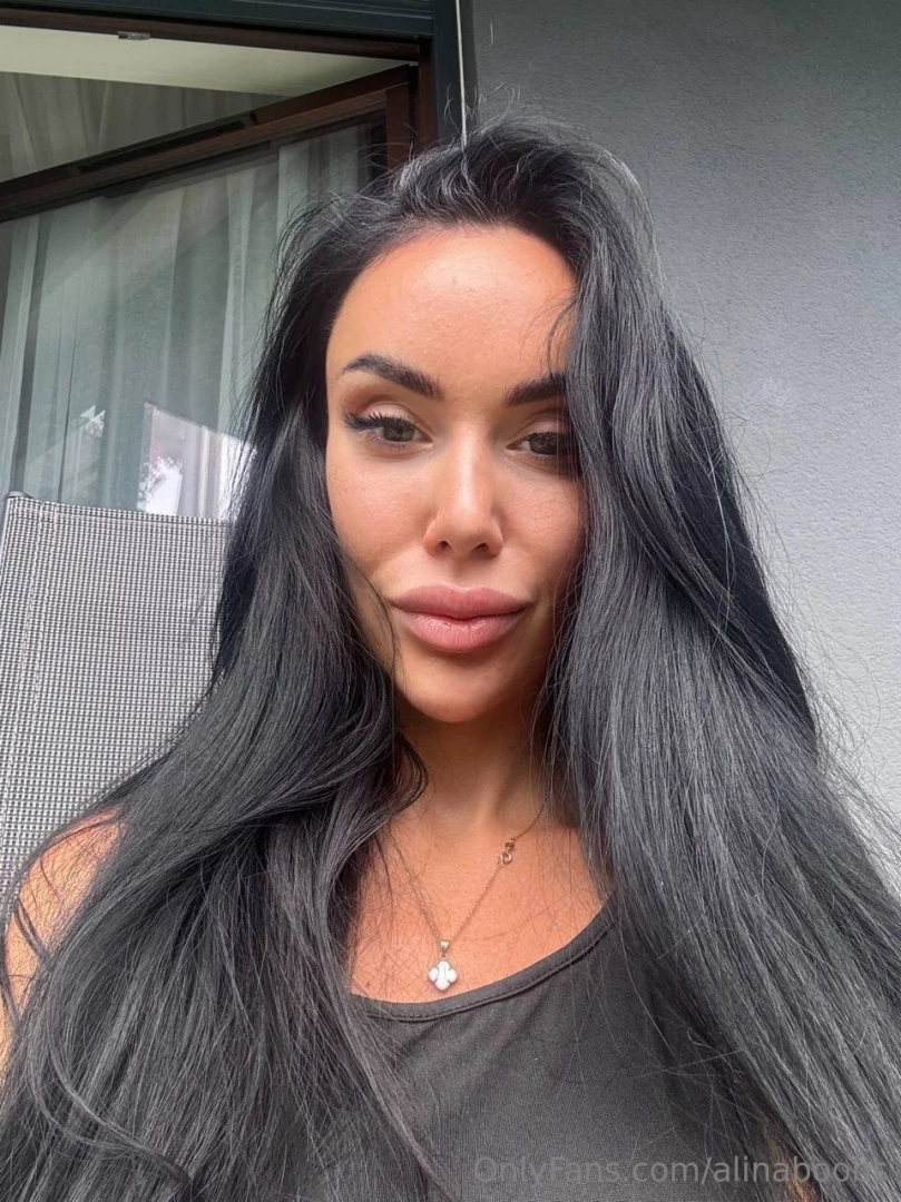 Lips with a bow eyebrows with a house look like a little sleepy gnome 