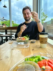 The man behind the dong took a walk to grab some tea and a salad for