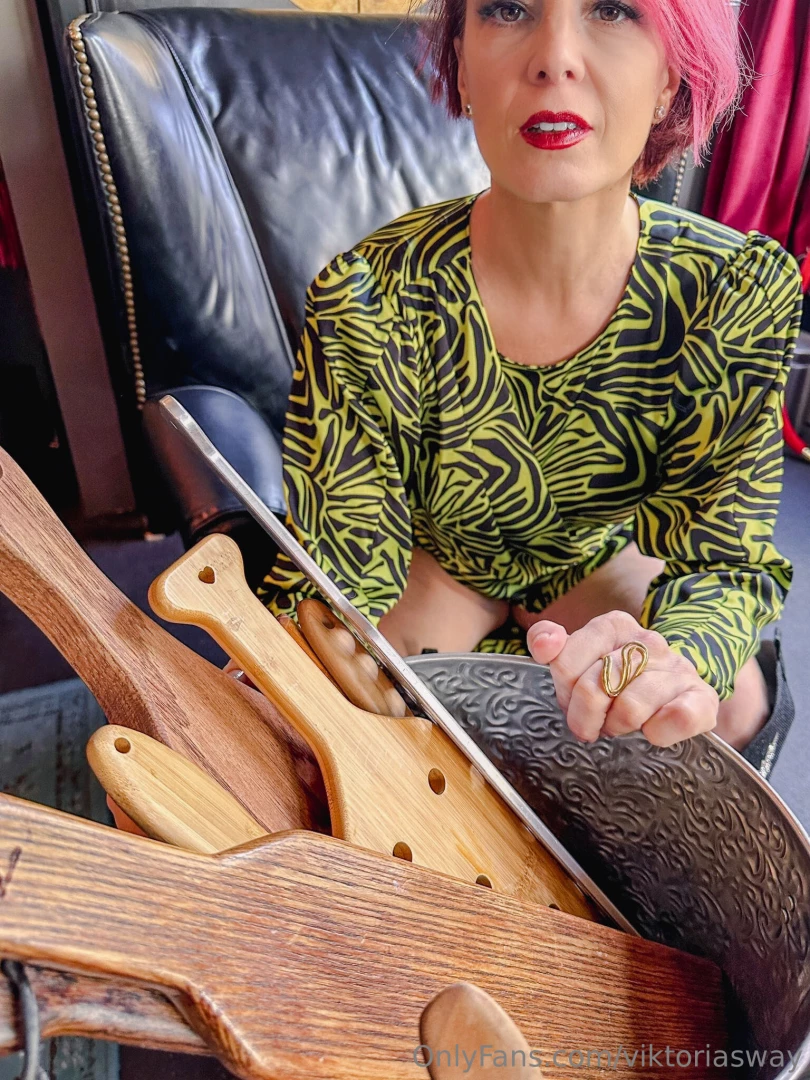 The wooden paddle commands attention with every strike its solid 