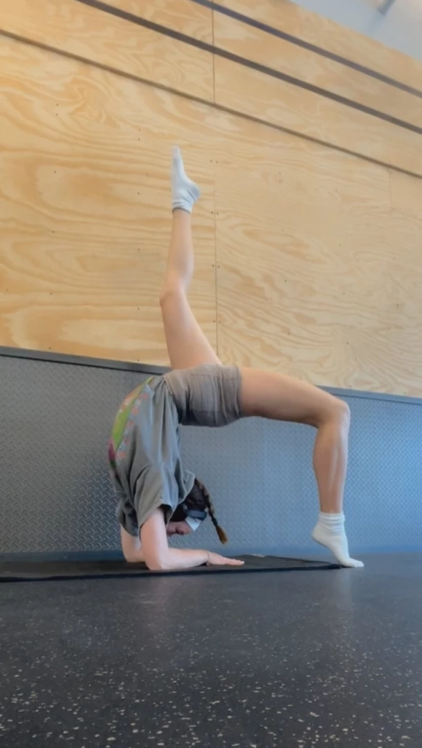 Backbend from a forearm stand 