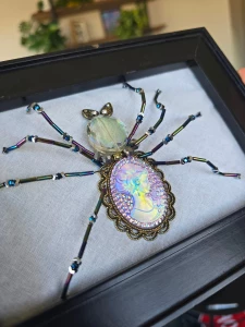 I made a bead embroidered spider go easy on me this is the first time
