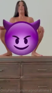 Riding a dildo on the dresser front view with the titties bouncing