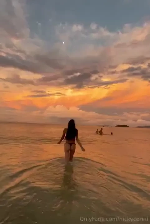 As the sun kisses the horizon painting the sky in hues of gold and 