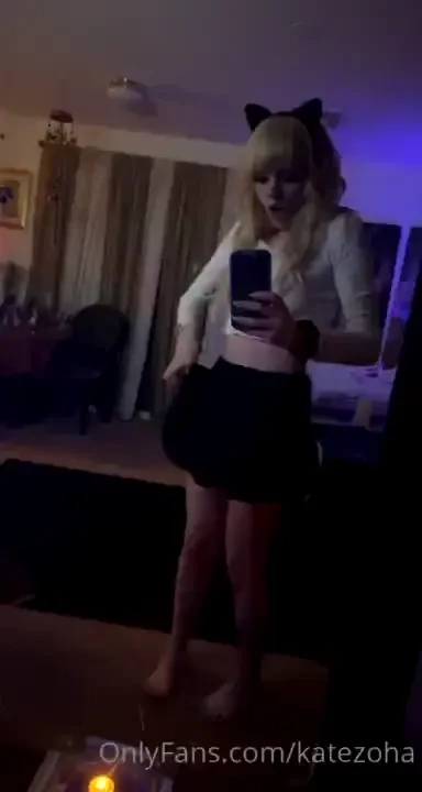 Doing a silly little dance in kitty girl clothes 
