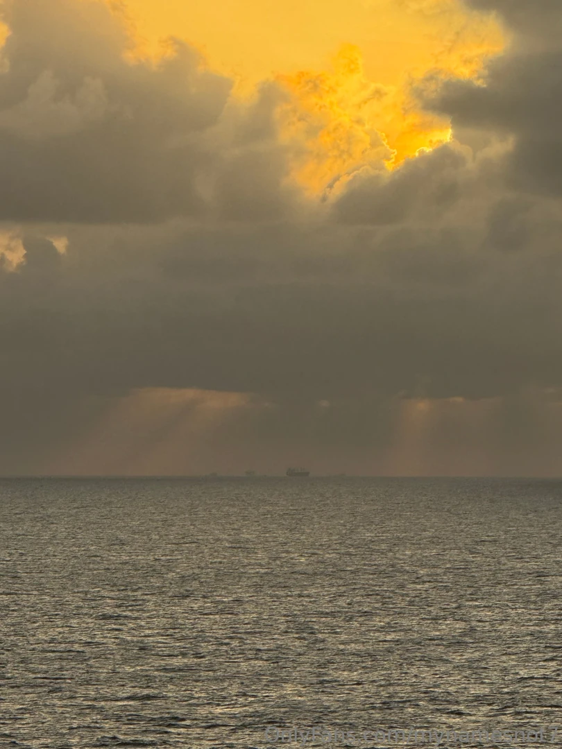 In the first pic there s a boat in the distance and in the second one 