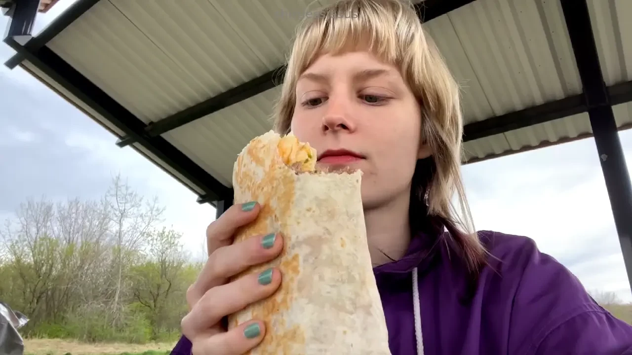 Eating a burrito in nature it s like 50 out but i still wanted to be 