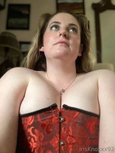 What do you think is the red corset better with my tits smooshed in or part 1