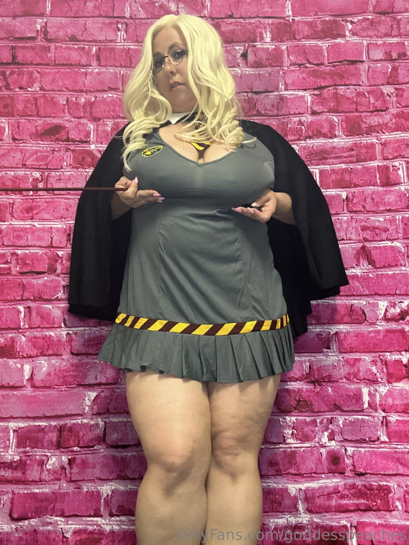 Butterbeer in one hand phone in the other 