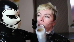 Kaya inserts a gag into sky s mouth wraps her head in wrap then stuffs