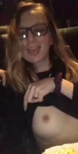 Flashing my pierced titties at the movie theater