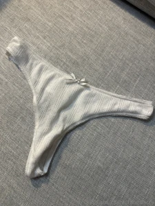 From the second row 1 light pink lace thong with pink rose above pussy part 3