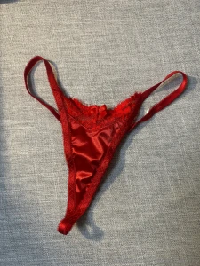 First row 1 red lacey christmas thong with bows 2 red lace thong with part 1