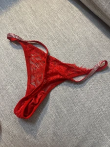 First row 1 red lacey christmas thong with bows 2 red lace thong with part 5