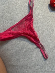 First row 1 red lacey christmas thong with bows 2 red lace thong with part 4